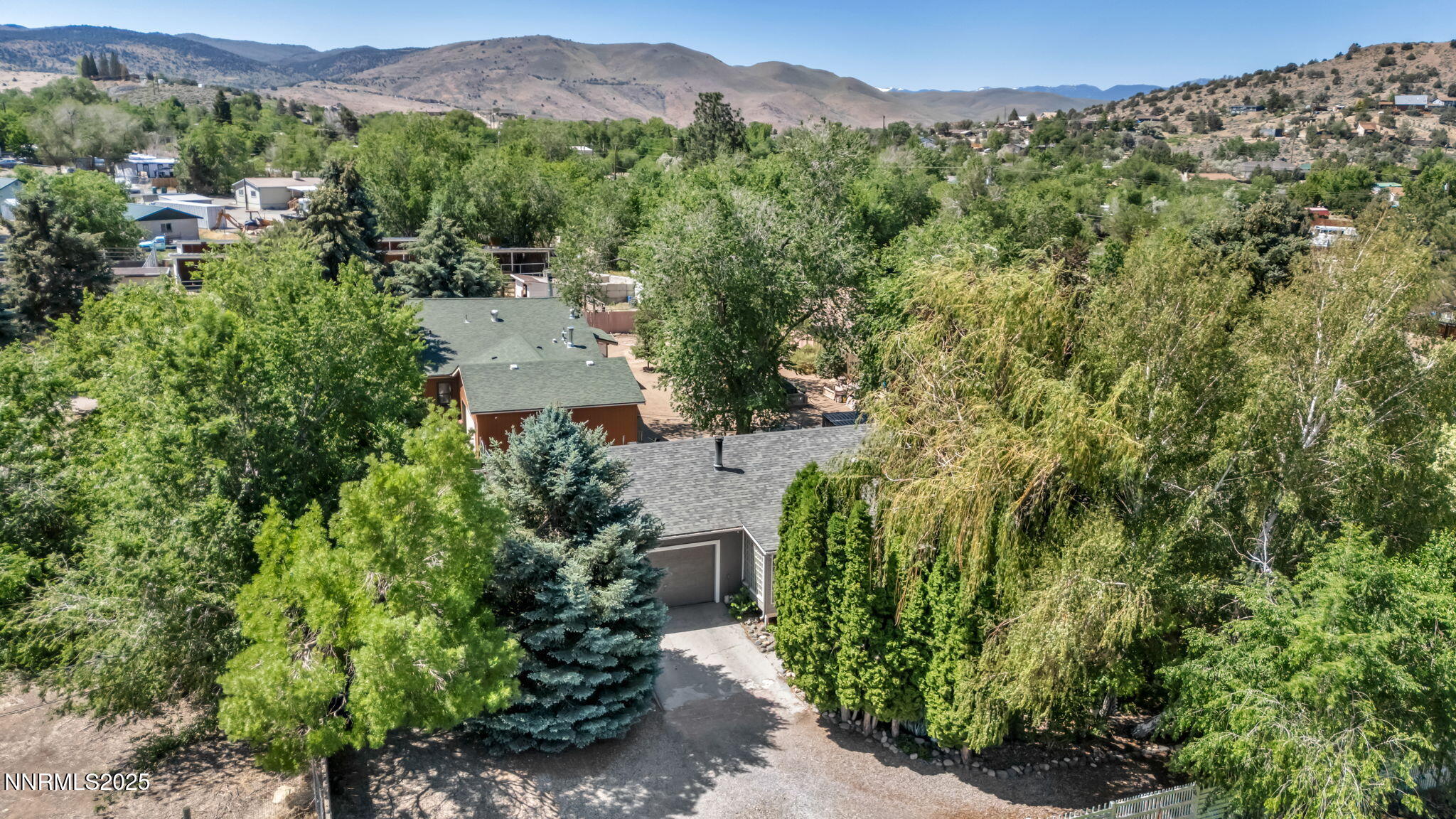 15333 Kivett Lane Reno, NV 89521 - Photo 32 of 38 an aerial view of a house with a yard