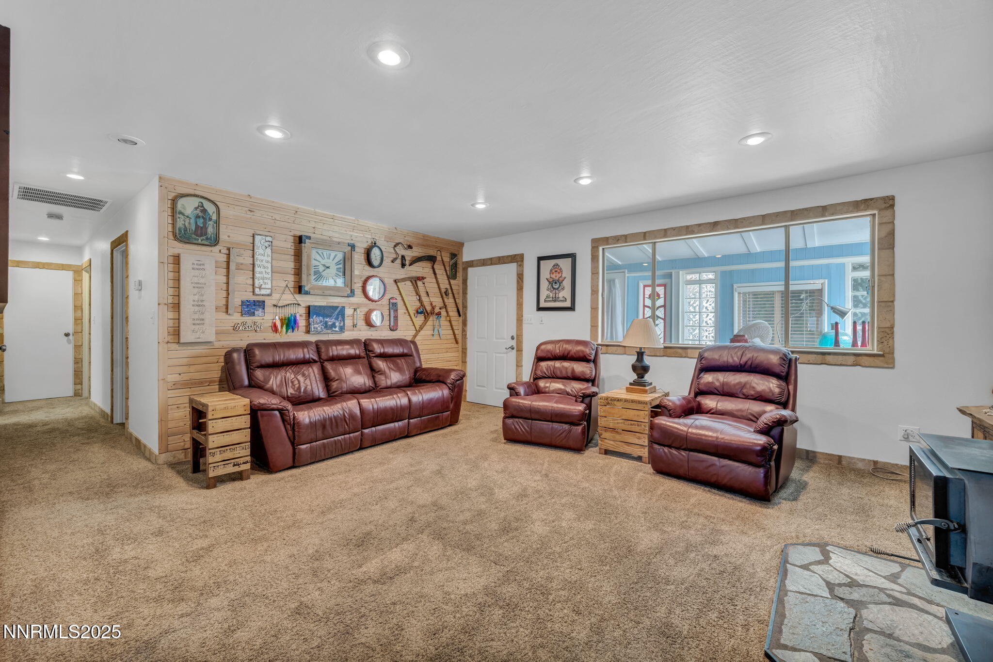 15333 Kivett Lane Reno, NV 89521 - Photo 8 of 38 a living room with furniture and a large window