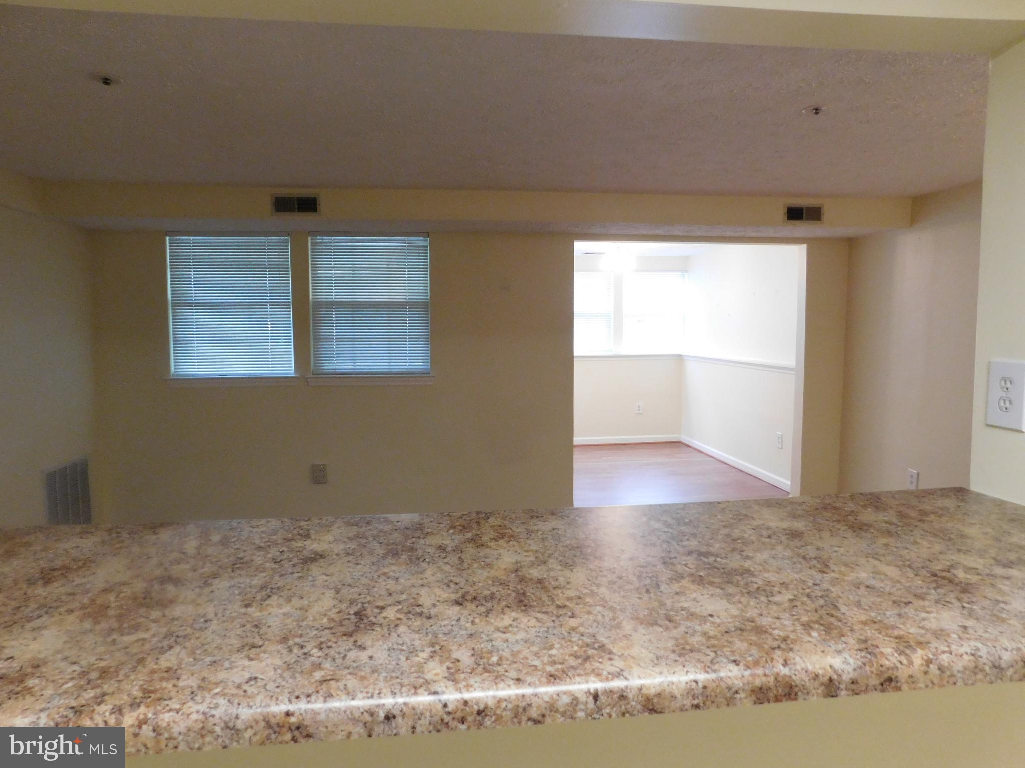 6375 Greenfield Road, Unit 1502 Elkridge, MD 21075 - Photo 6 of 20 View front kitchen into living/dining area