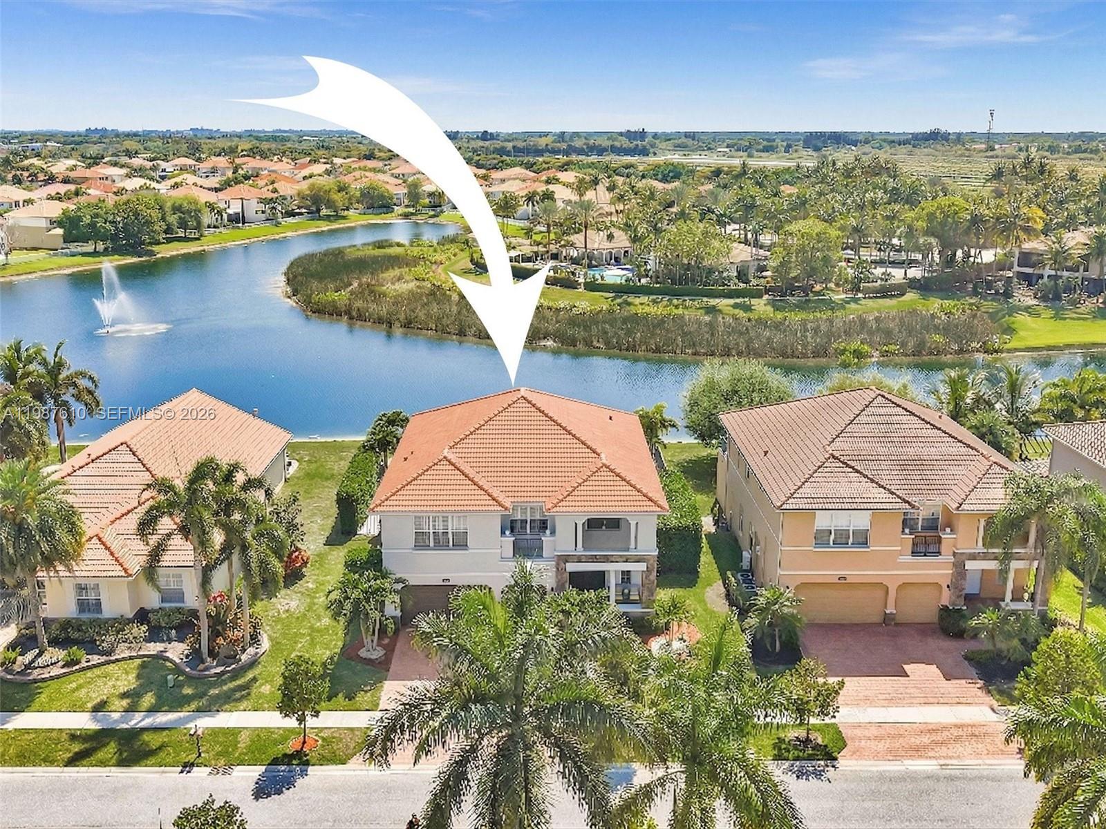 8878 Cobblestone Point Circle Boynton Beach, FL 33472 - Photo 1 of 89 an aerial view of residential houses with outdoor space