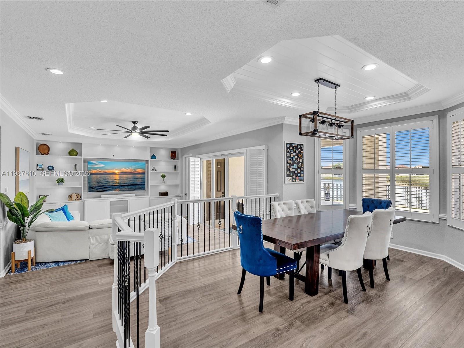 8878 Cobblestone Point Circle Boynton Beach, FL 33472 - Photo 21 of 89 a view of a dining room with furniture window and wooden floor