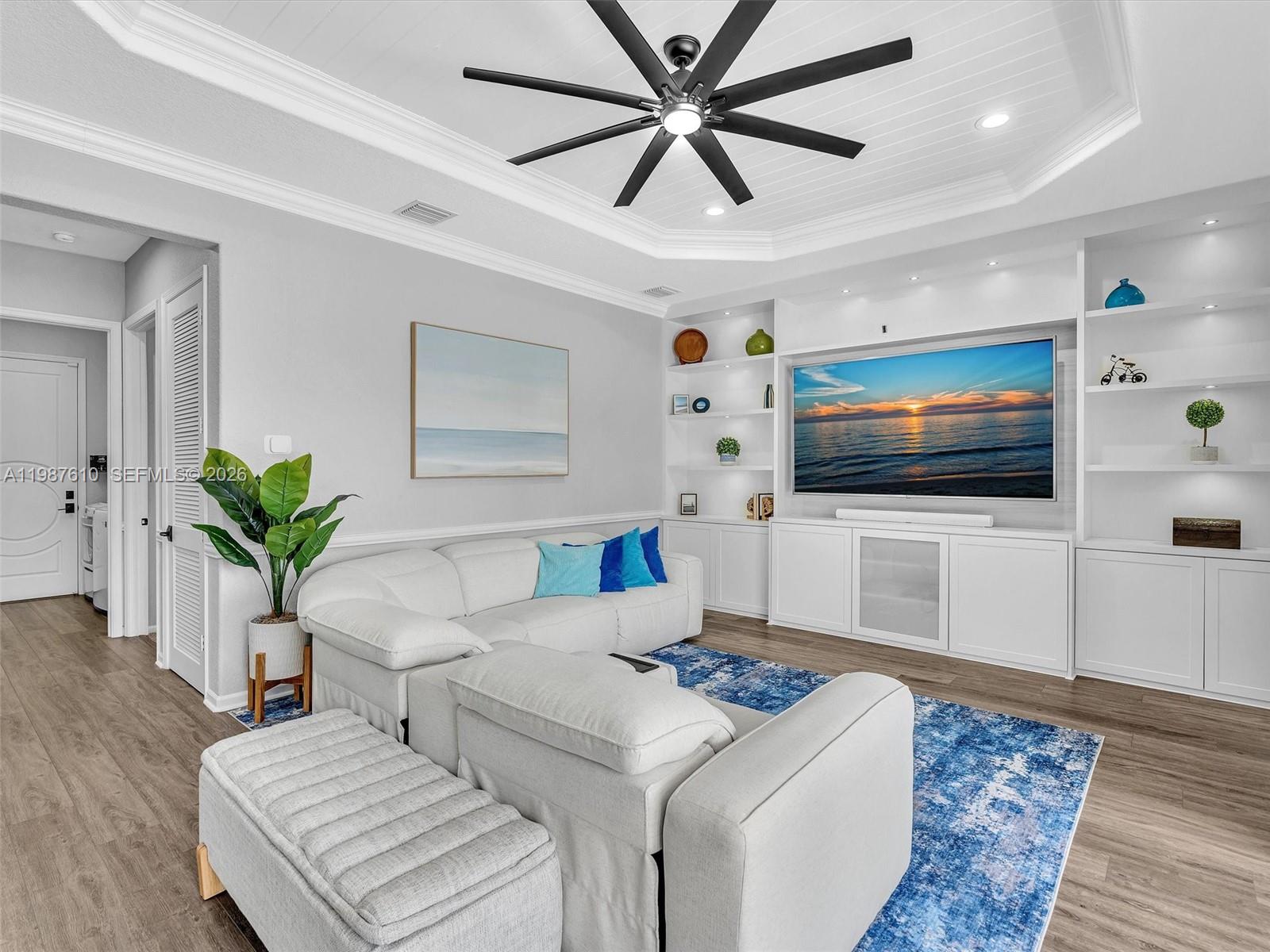 8878 Cobblestone Point Circle Boynton Beach, FL 33472 - Photo 27 of 89 a living room with furniture and a flat screen tv