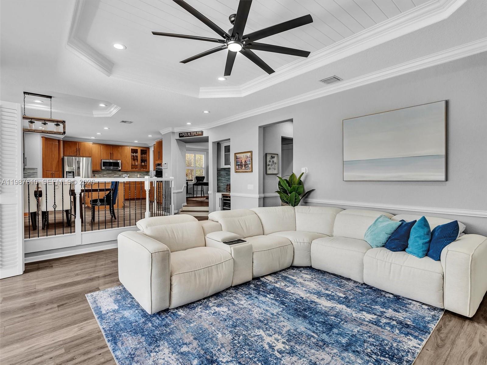 8878 Cobblestone Point Circle Boynton Beach, FL 33472 - Photo 28 of 89 a living room with furniture and view of kitchen