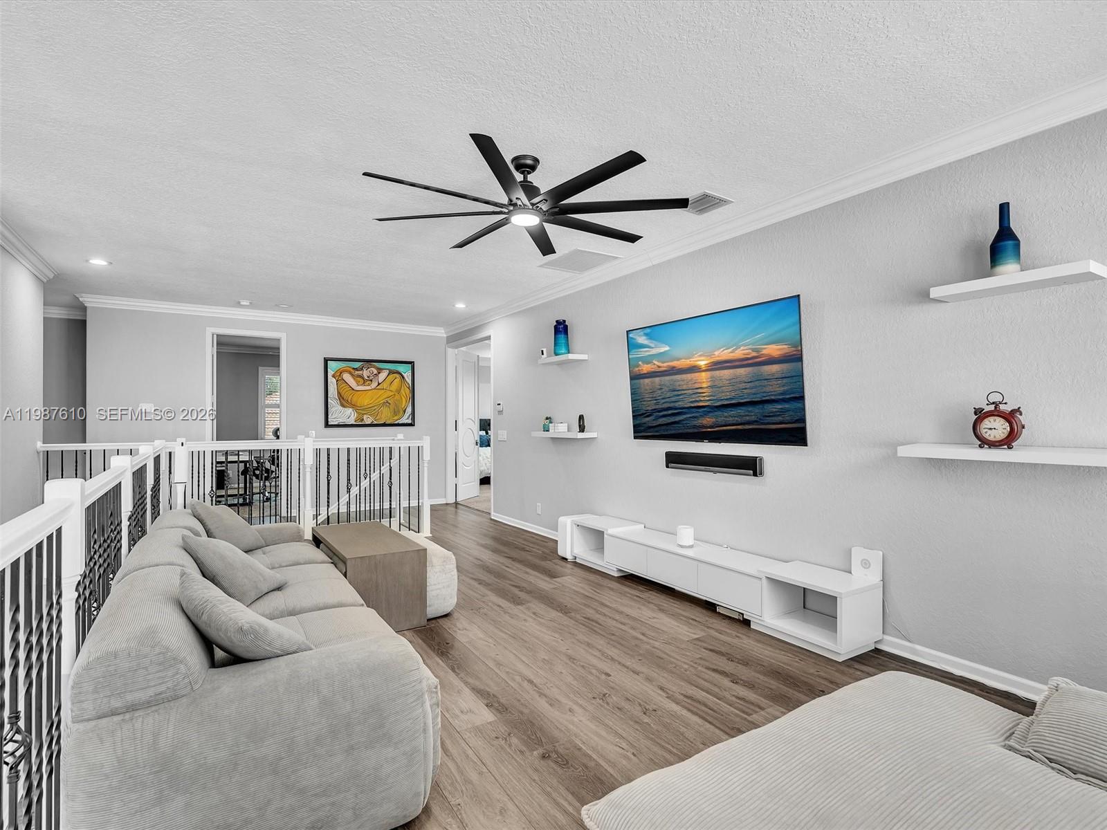 8878 Cobblestone Point Circle Boynton Beach, FL 33472 - Photo 44 of 89 a living room with furniture and a flat screen tv