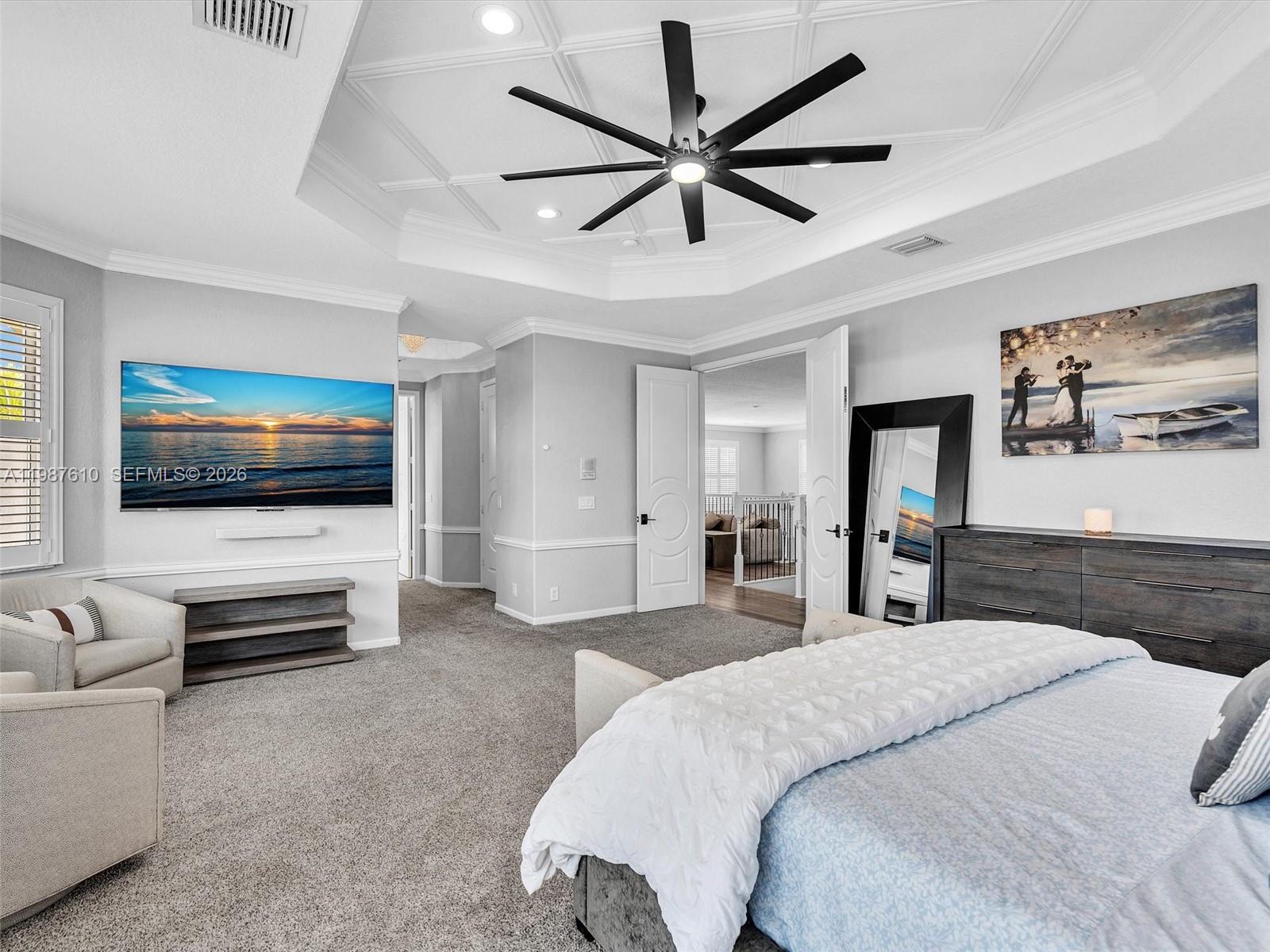 8878 Cobblestone Point Circle Boynton Beach, FL 33472 - Photo 48 of 89 a bedroom with a bed and a flat screen tv