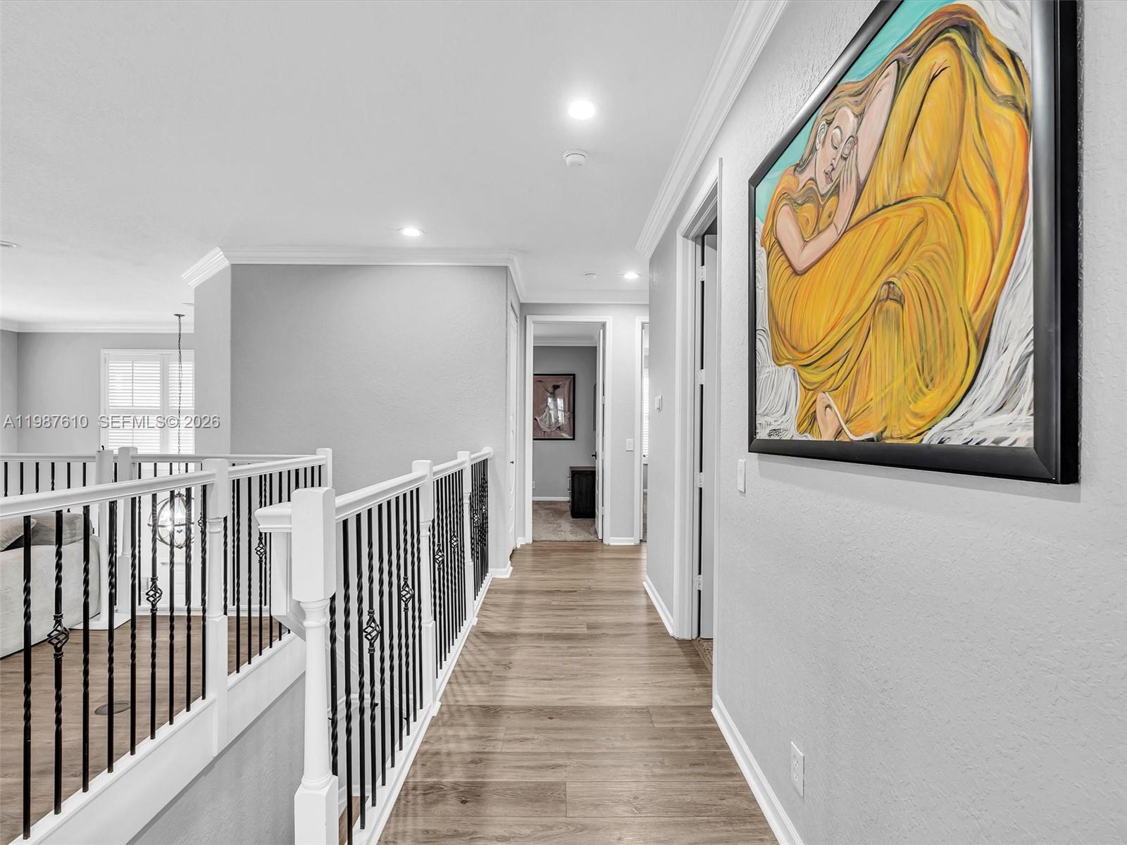 8878 Cobblestone Point Circle Boynton Beach, FL 33472 - Photo 63 of 89 a view of a hallway with wooden floor