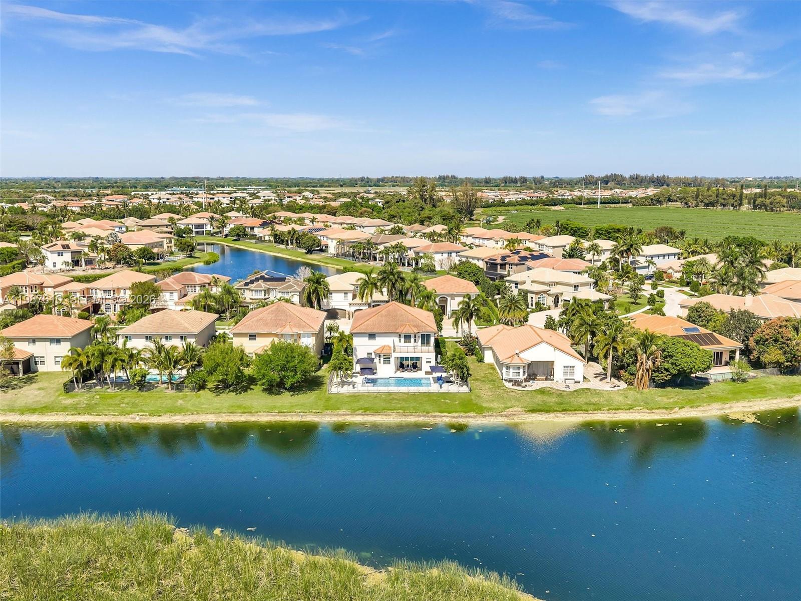 8878 Cobblestone Point Circle Boynton Beach, FL 33472 - Photo 78 of 89 an aerial view of residential building and lake