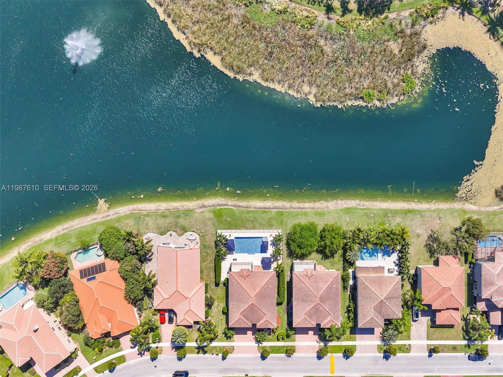 8878 Cobblestone Point Circle Boynton Beach, FL 33472 - Photo 79 of 89 an aerial view of residential houses with outdoor space and trees