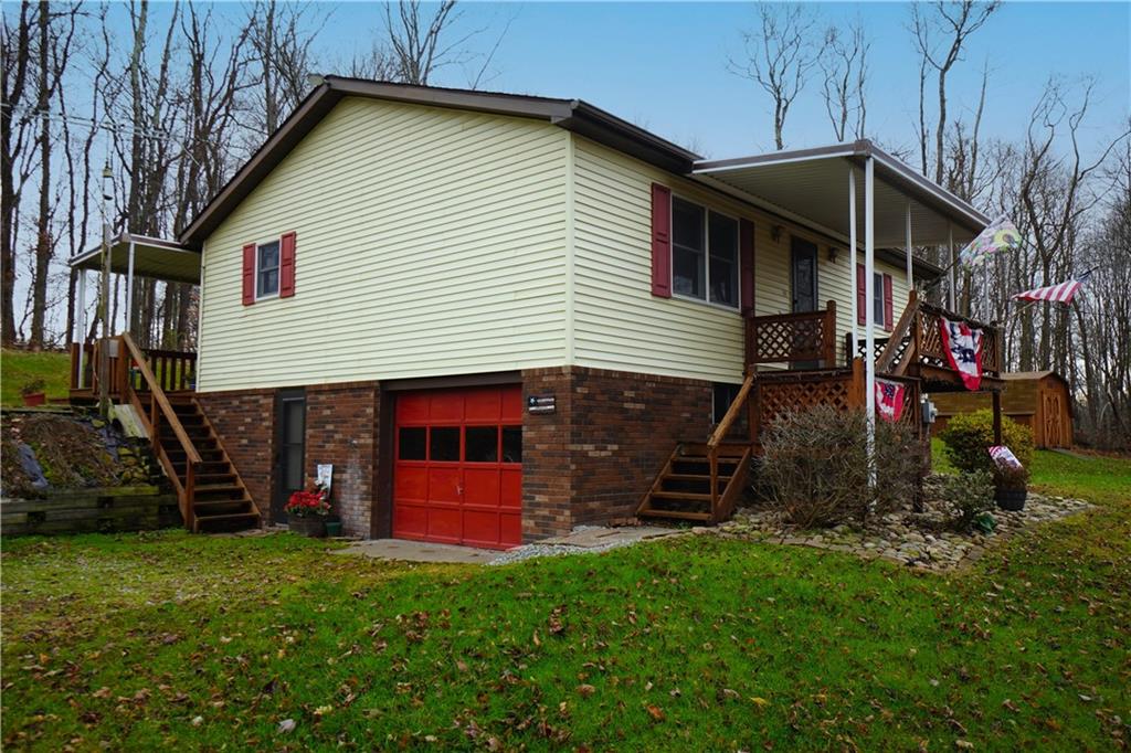 243 Gaskill Road Grindstone, PA 15442 - Photo 2 of 17 a view of a house with a yard