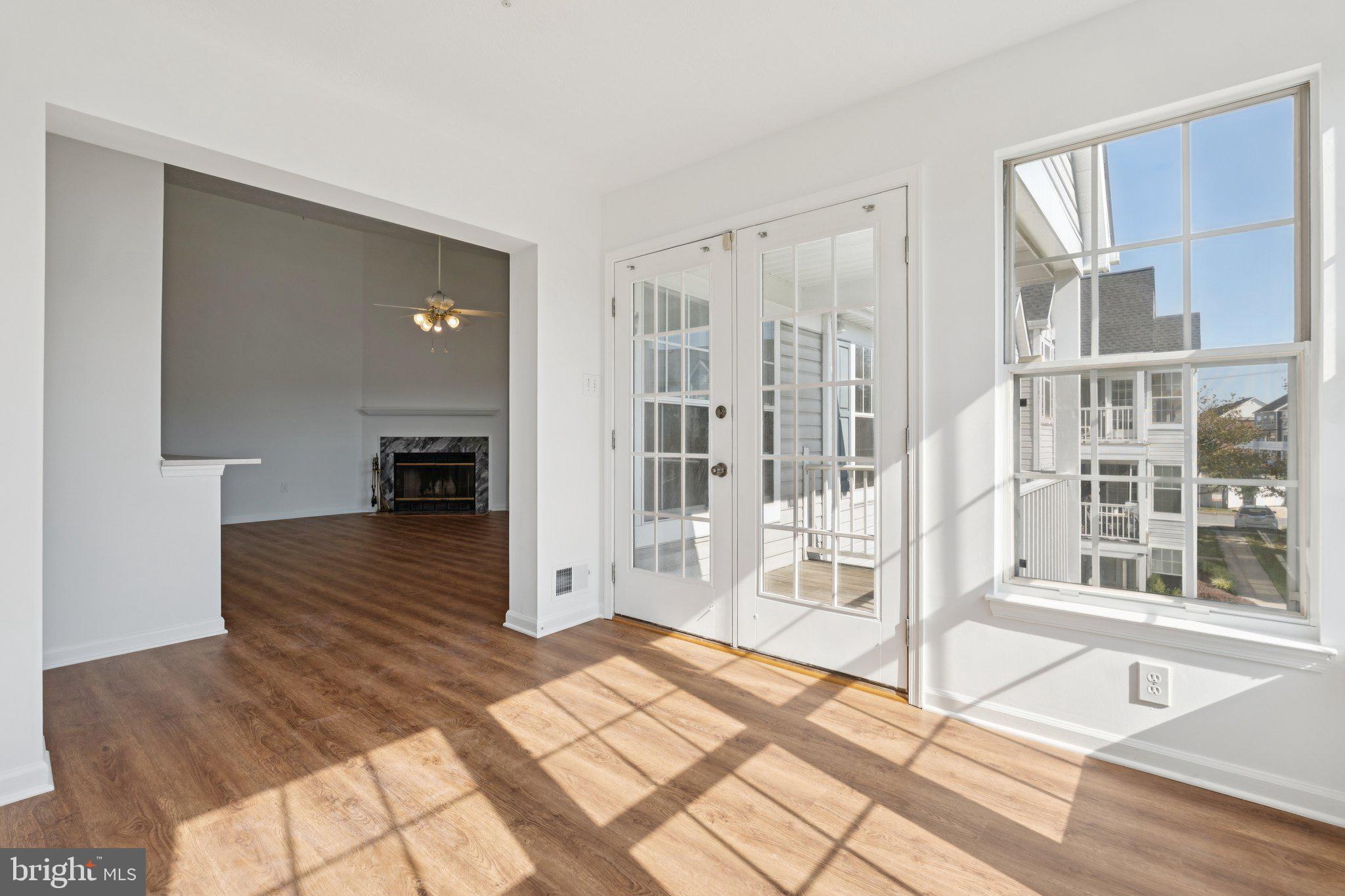 7655 Gladstone Road, Unit 5 Baltimore, MD 21244 - Photo 9 of 25 a view of livingroom with furniture and wooden floor