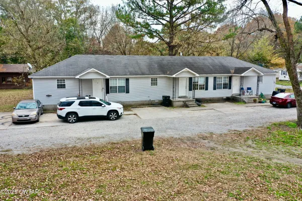 a car parked in front of a house