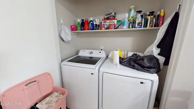a utility room with dryer and washer