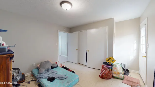 a room with furniture and a wooden floor