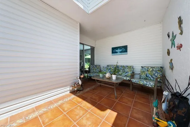 a view of a room with chair and tables