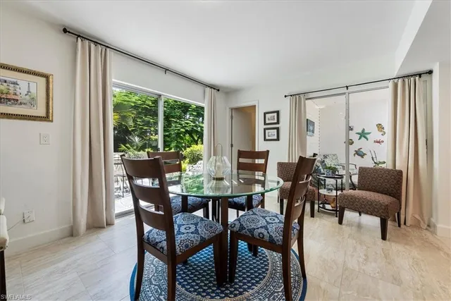 a view of a livingroom and dining room