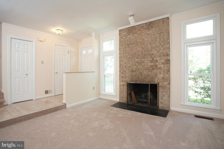 9123 Saffron Lane Silver Spring, MD 20901 - Photo 15 of 26 A woodburning fireplace makes for cozy evenings!