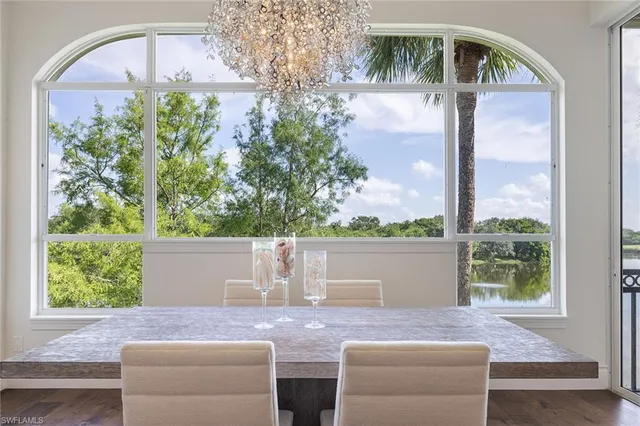 a view of house with backyard