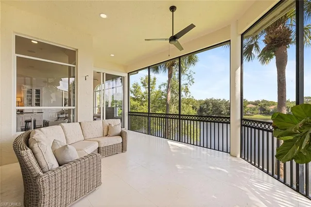 a view of a living room and a balcony