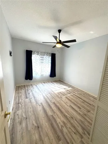 a view of a livingroom with a window