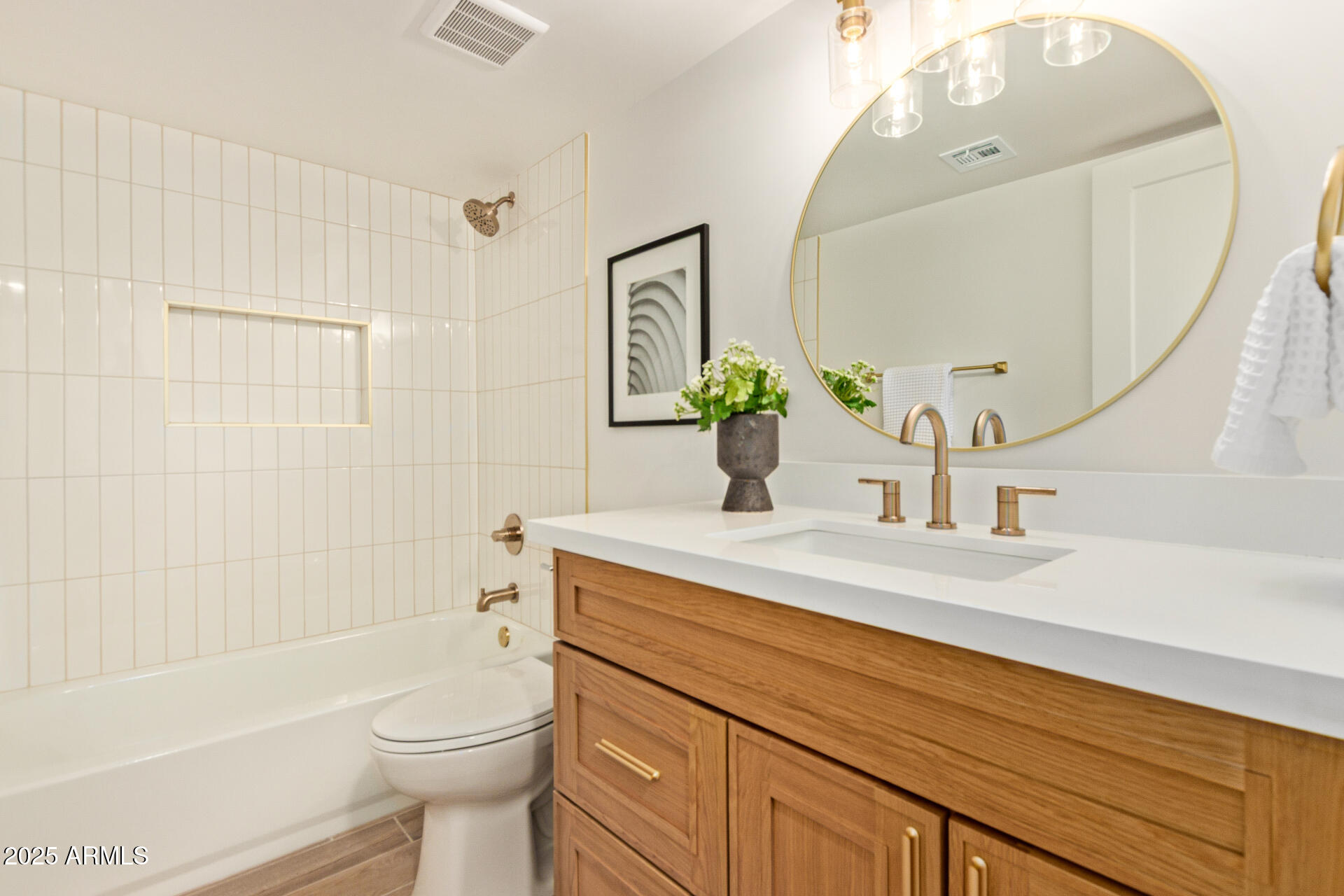 4201 East Camelback Road, Unit 28 Phoenix, AZ 85018 - Photo 7 of 15 a bathroom with a sink a toilet and shower
