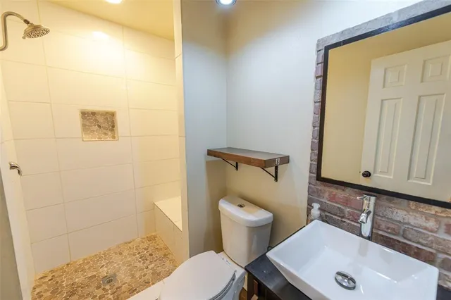 a bathroom with a sink and a toilet