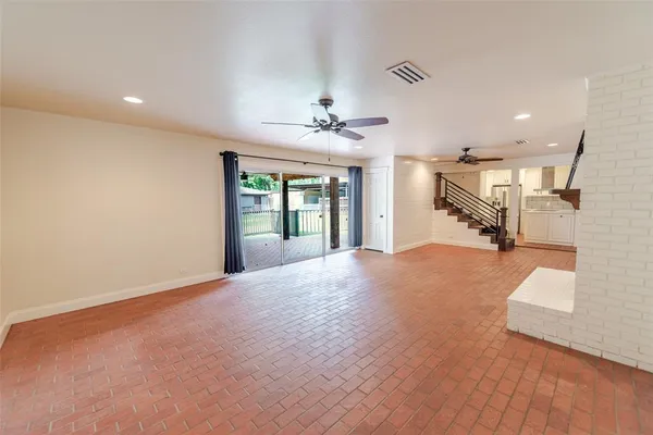 a view of a livingroom with a staircase