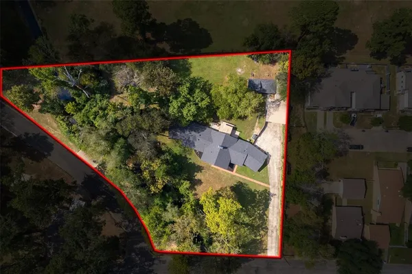 a view of a garden from a balcony