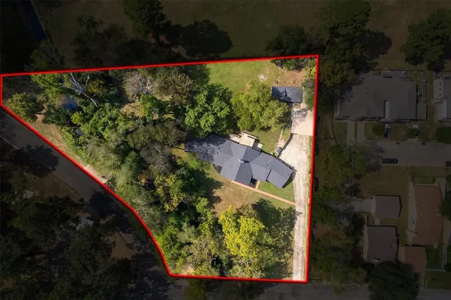 a view of a garden from a balcony