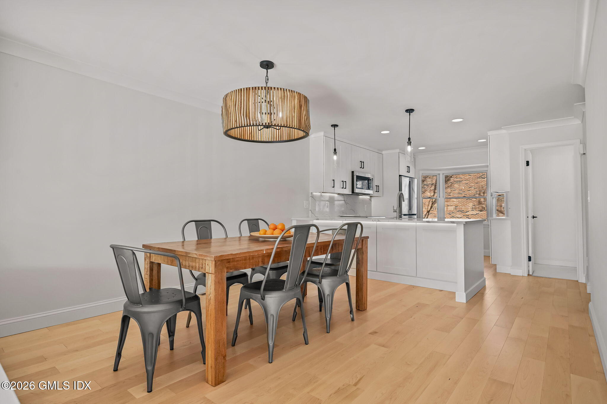 115 River Road, Unit 7 Cos Cob, CT 06807 - Photo 4 of 17 a view of a dining room with furniture