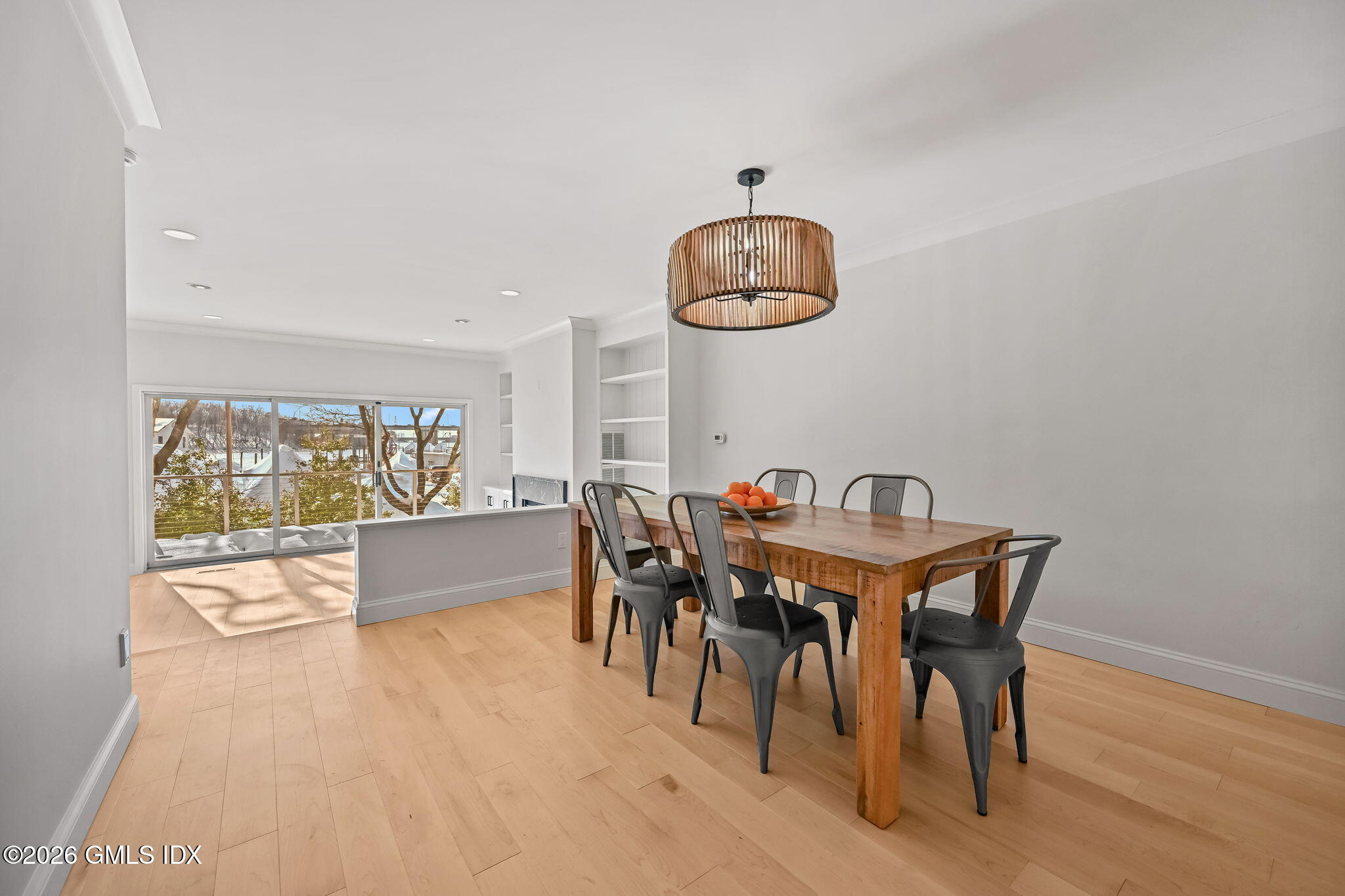 115 River Road, Unit 7 Cos Cob, CT 06807 - Photo 5 of 17 a view of a dining room with furniture window and outside view