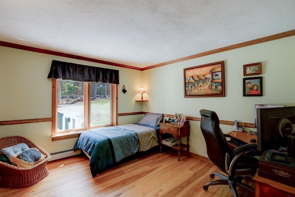 205 East Rindge Road Ashburnham, MA 01430 - Photo 35 of 40 a bedroom with a bed and a window