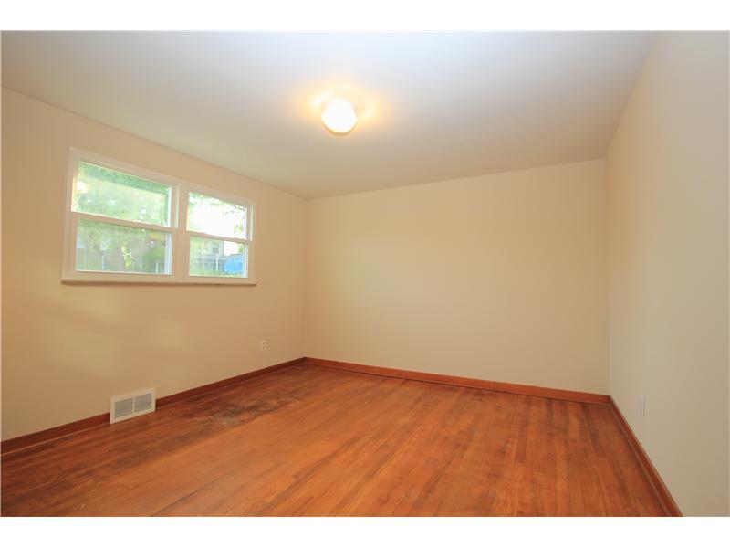 3428 Willett Road Baldwin, PA 15227 - Photo 6 of 17 Master Bedroom. Recently exposed hardwood floors, two large windows shower the room in natural light and the room has been freshly painted.