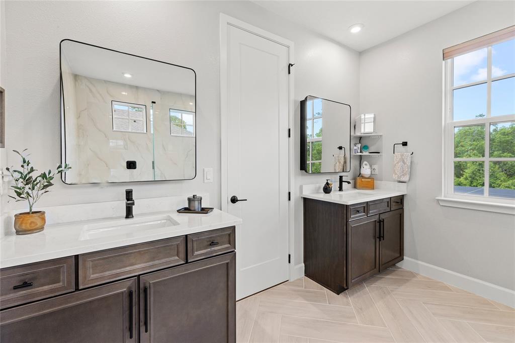 7445 Estuary Lk Loop Kissimmee, FL 34747 - Photo 18 of 54 a bathroom with a sink and a mirror