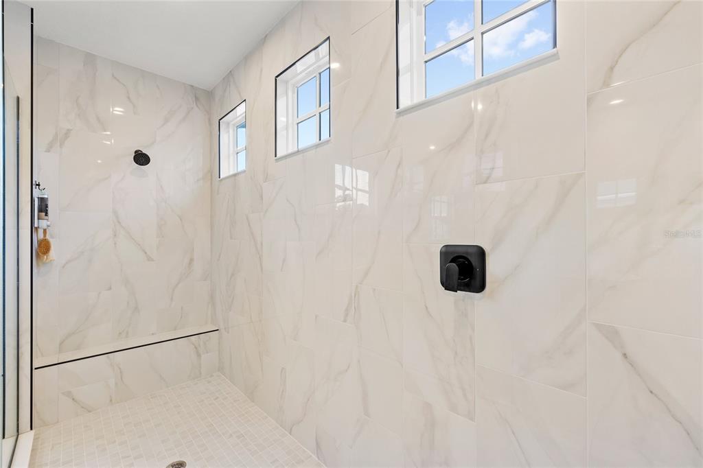 7445 Estuary Lk Loop Kissimmee, FL 34747 - Photo 21 of 54 a bathroom with a shower