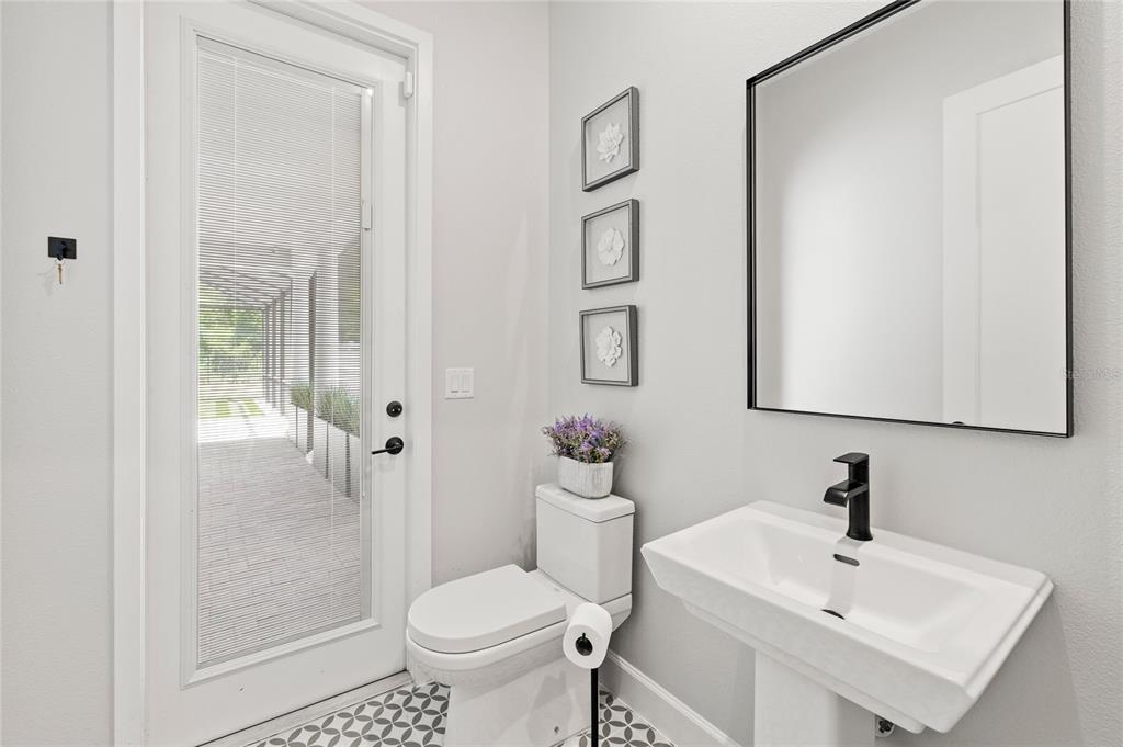 7445 Estuary Lk Loop Kissimmee, FL 34747 - Photo 29 of 54 a bathroom with a sink toilet and shower