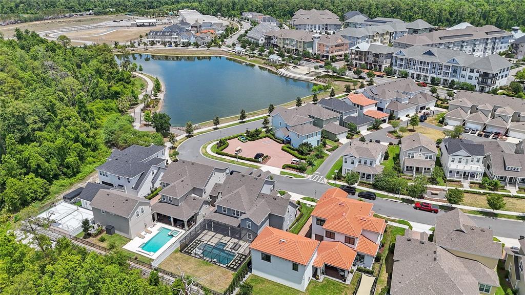 7445 Estuary Lk Loop Kissimmee, FL 34747 - Photo 52 of 54 an aerial view of a house with a lake view