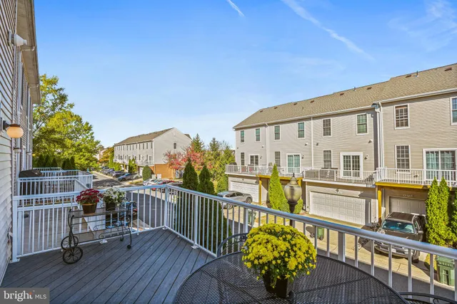 a view of a balcony with chairs