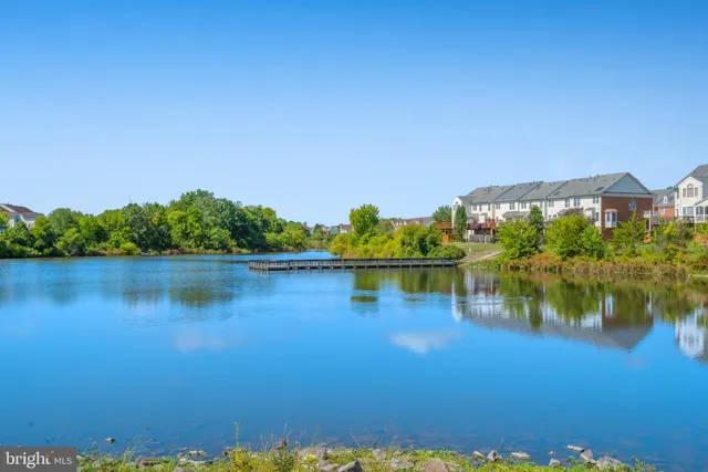 a view of lake with green space