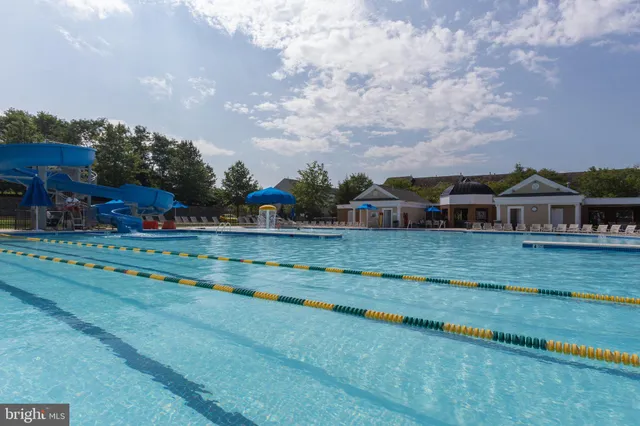 a aerial view of a house with a yard