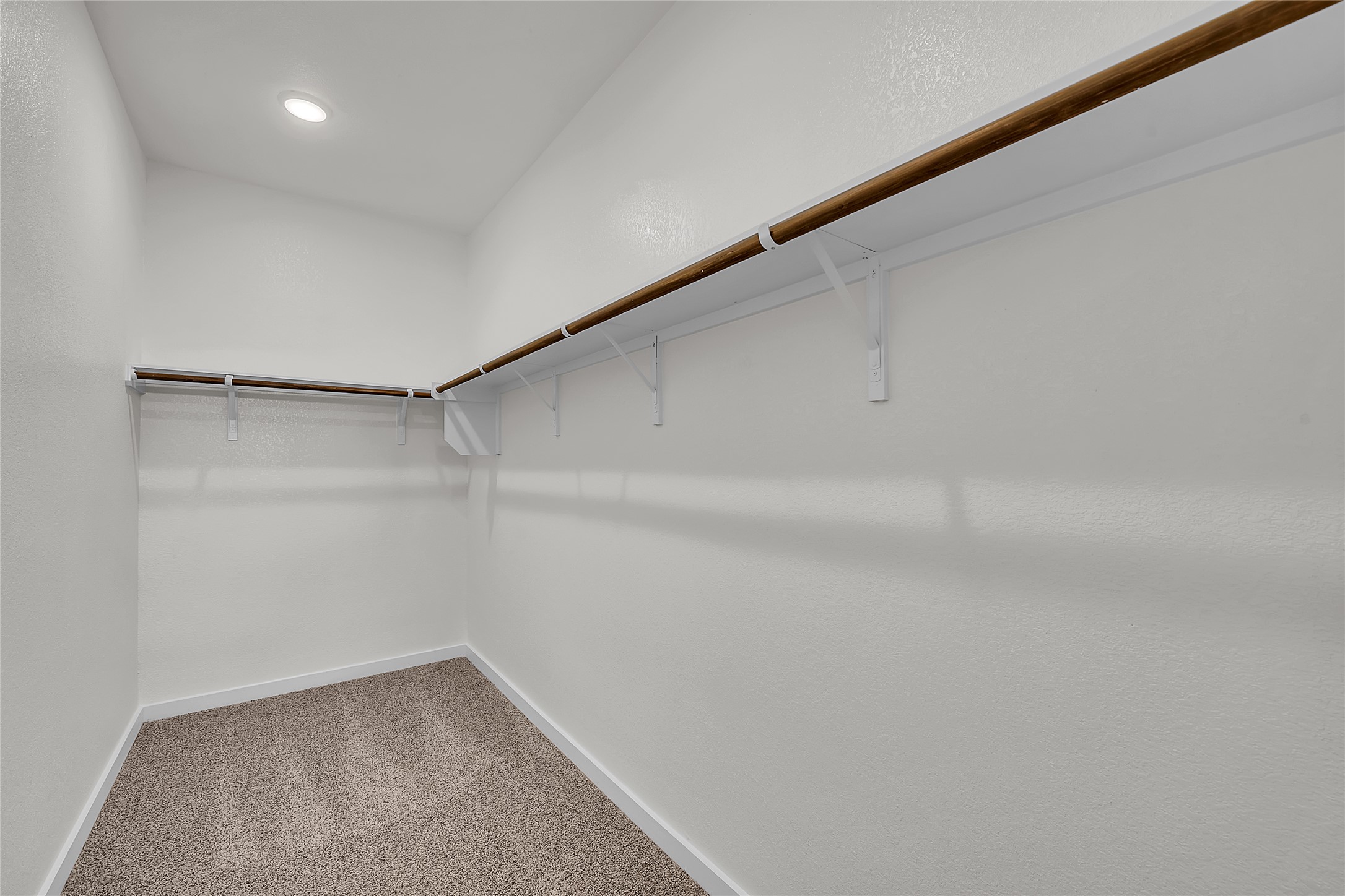 308 Boatright Boulevard Jarrell, TX 76537 - Photo 15 of 31 Spacious closet featuring light carpet