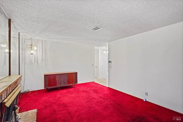 a bedroom with a bed and a closet