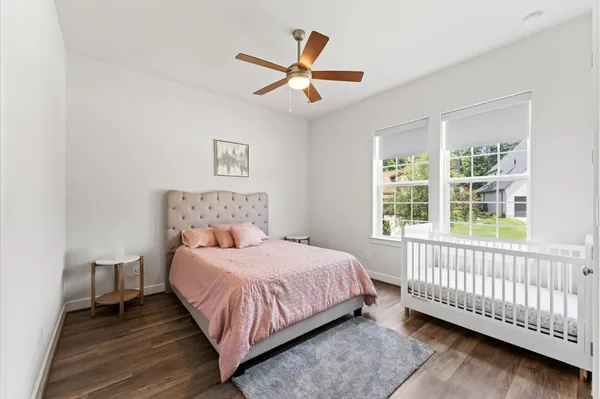 a bedroom with a bed and a cabinets