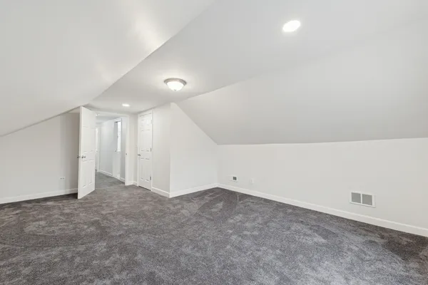 a view of a livingroom with wooden floor