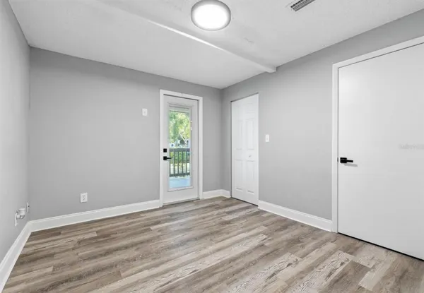 wooden floor and window in a room