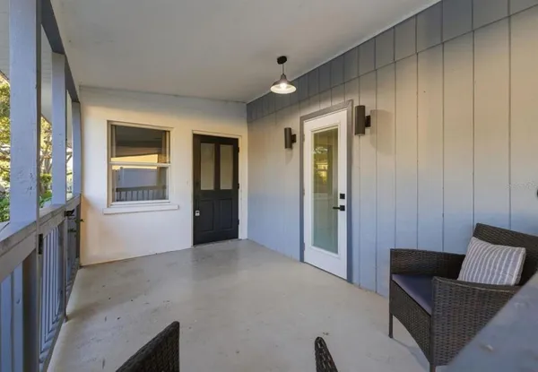 a view of livingroom with furniture and windows