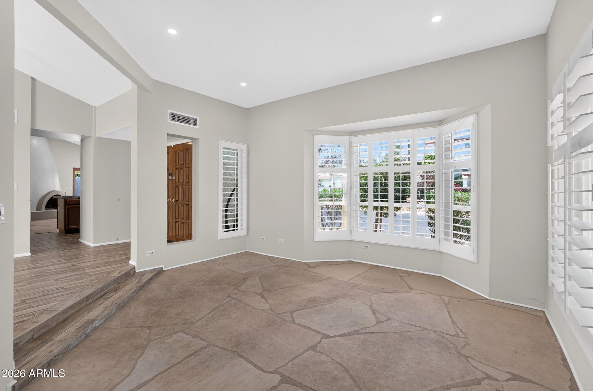 4615 East Monte Way Phoenix, AZ 85044 - Photo 29 of 35 a view of an empty room with a window