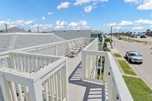 a view of a balcony with city view