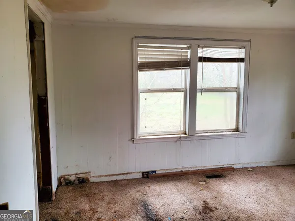 an empty room with a window