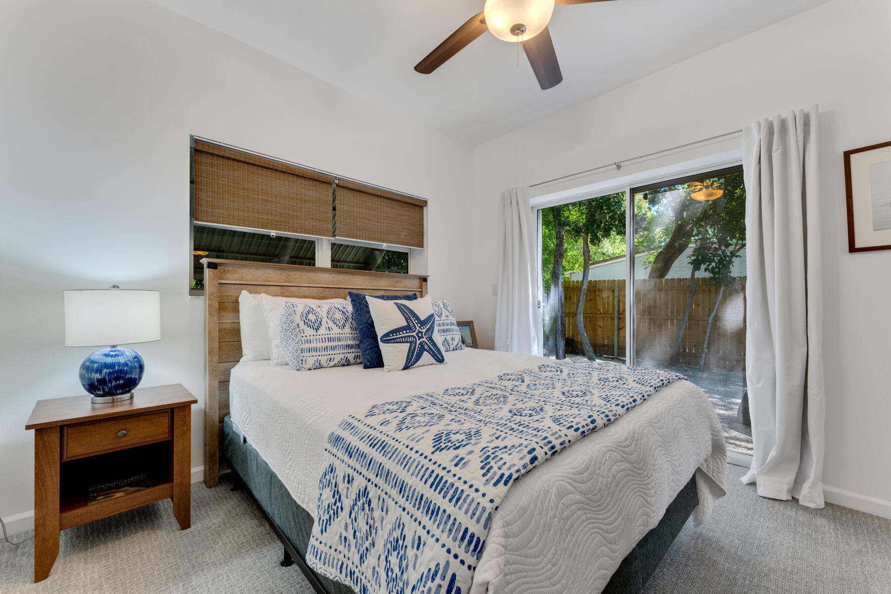 150 Apache Street Tavernier, FL 33070 - Photo 17 of 32 a bedroom with a bed and window