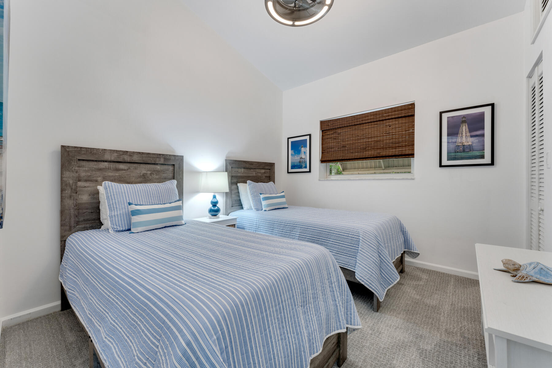 150 Apache Street Tavernier, FL 33070 - Photo 18 of 32 a bedroom with a bed and a flat screen tv